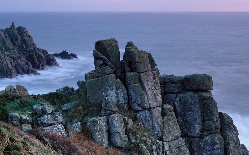 Rugged coastal rocks at dusk