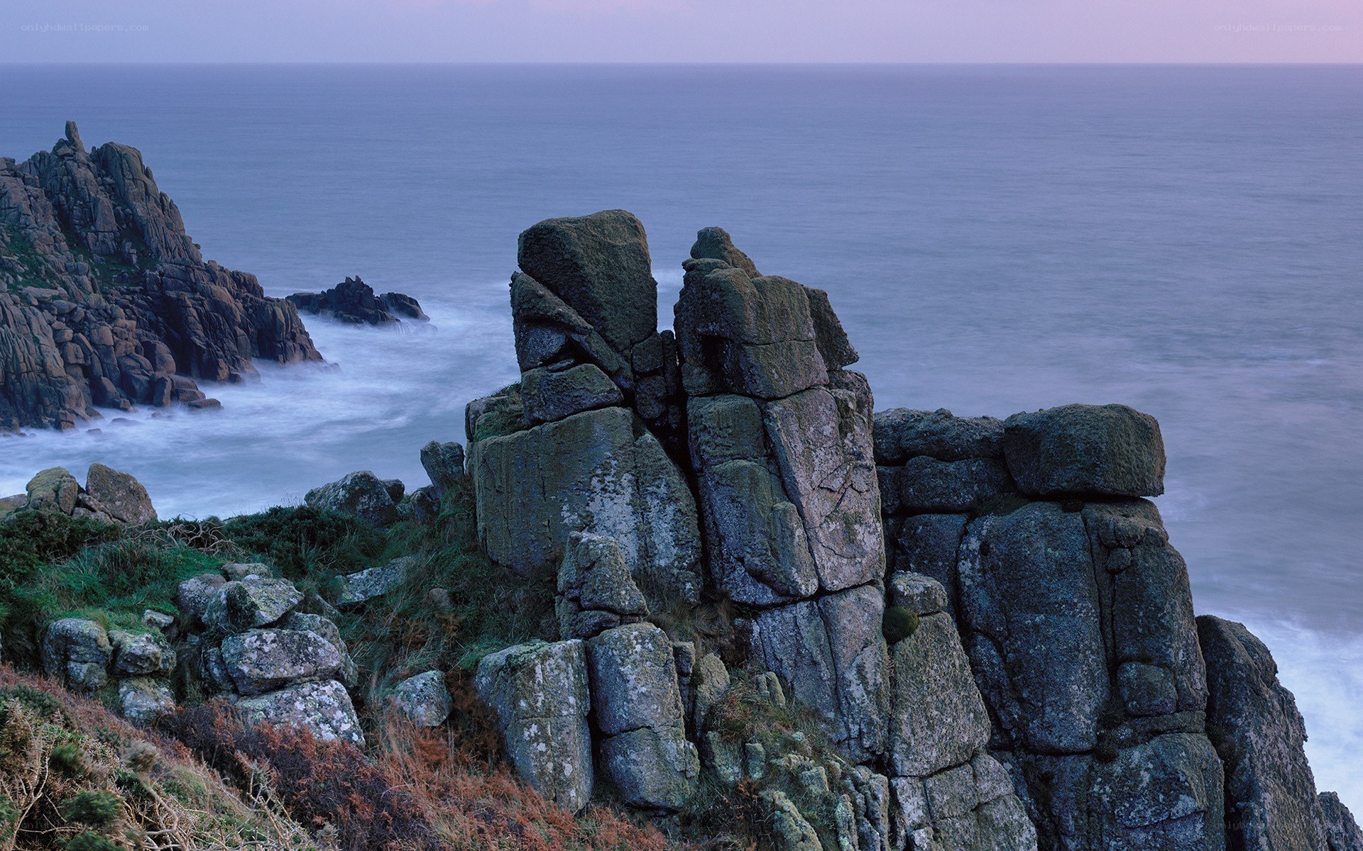 Rugged coastal rocks at dusk