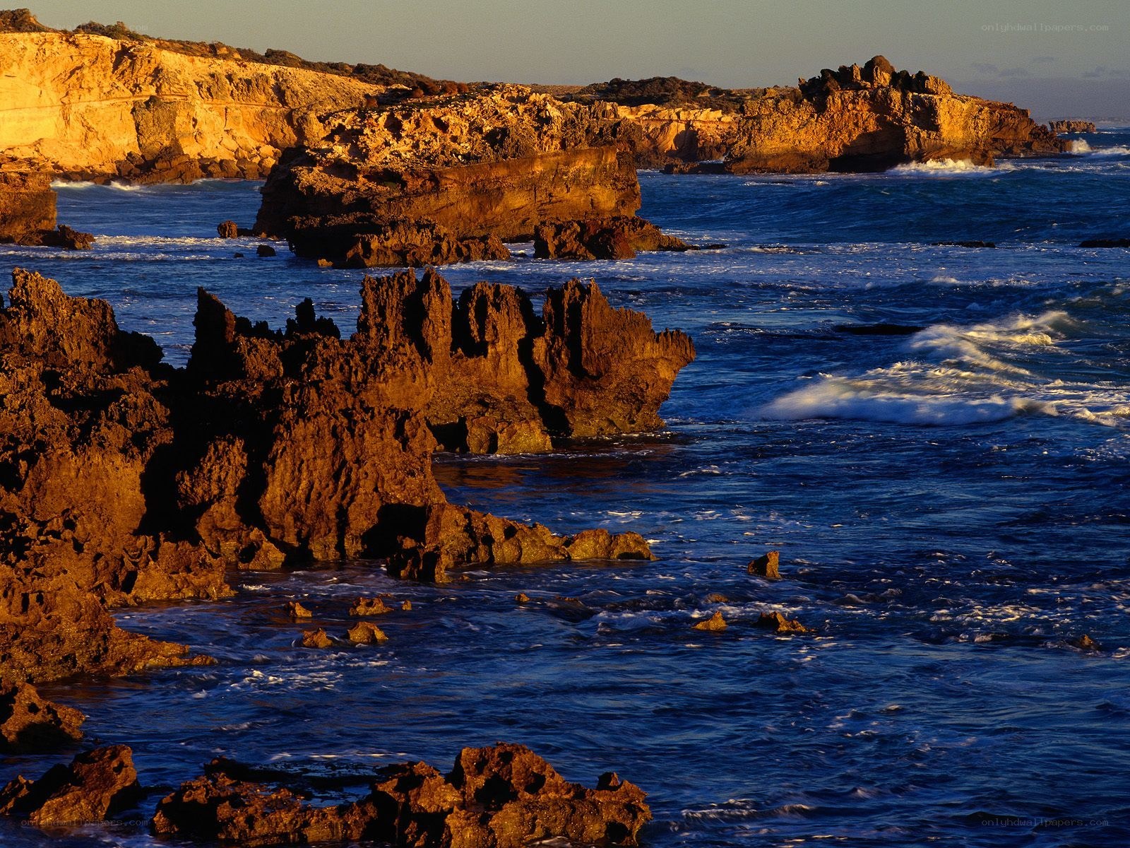 Rugged coastal rocks at sunset