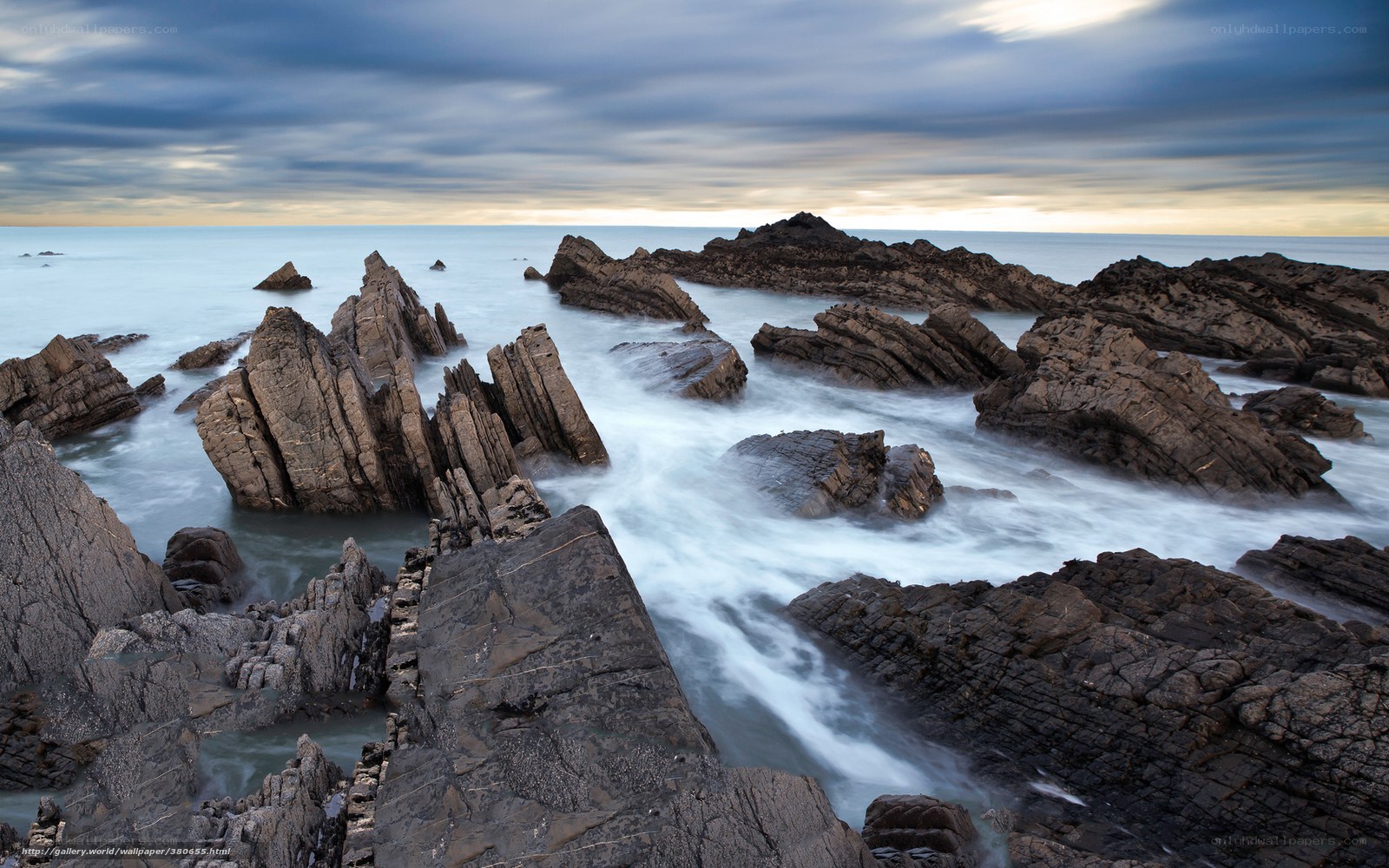 Rugged coastal rocks at sunset