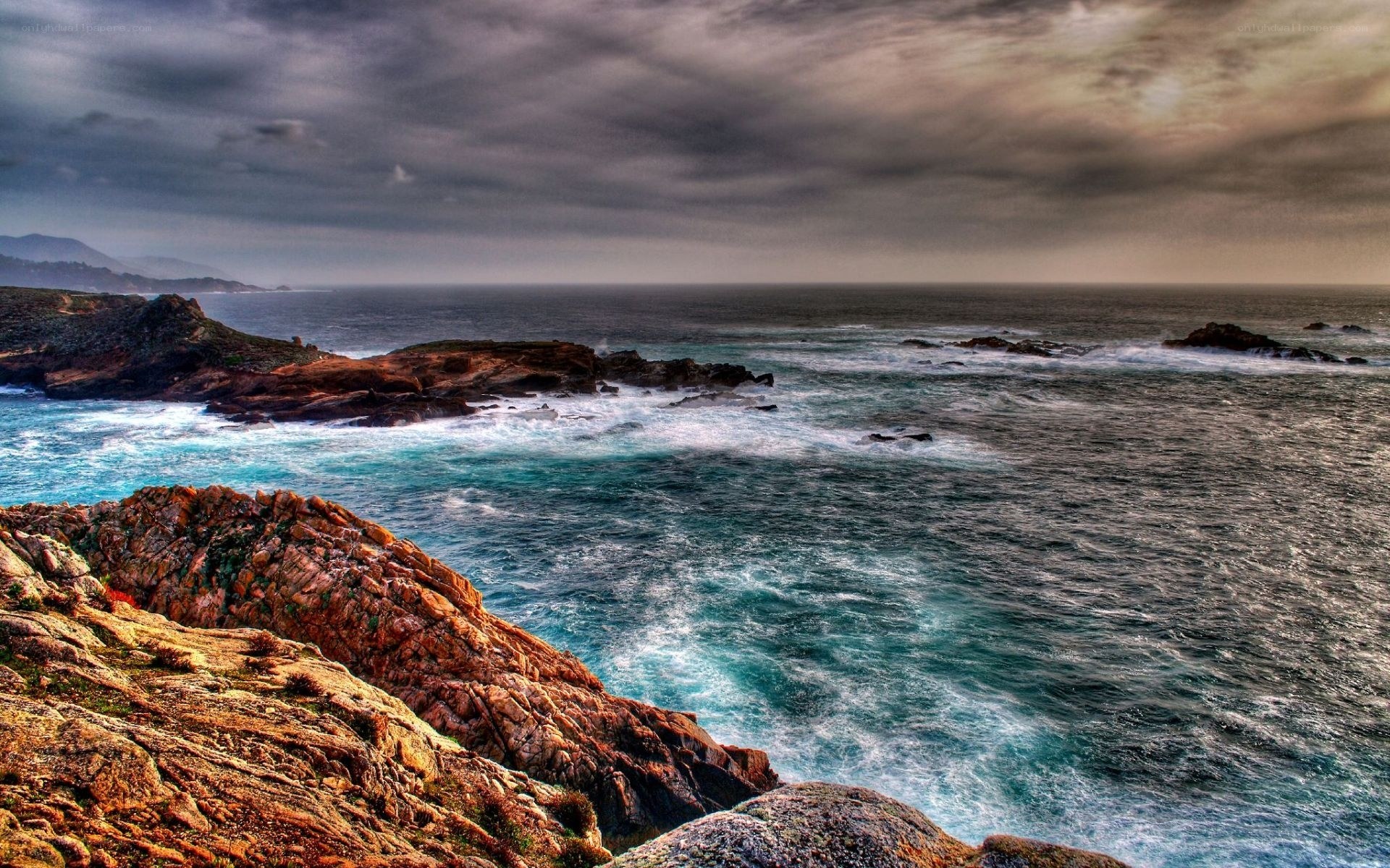 Rugged coastline under stormy sky