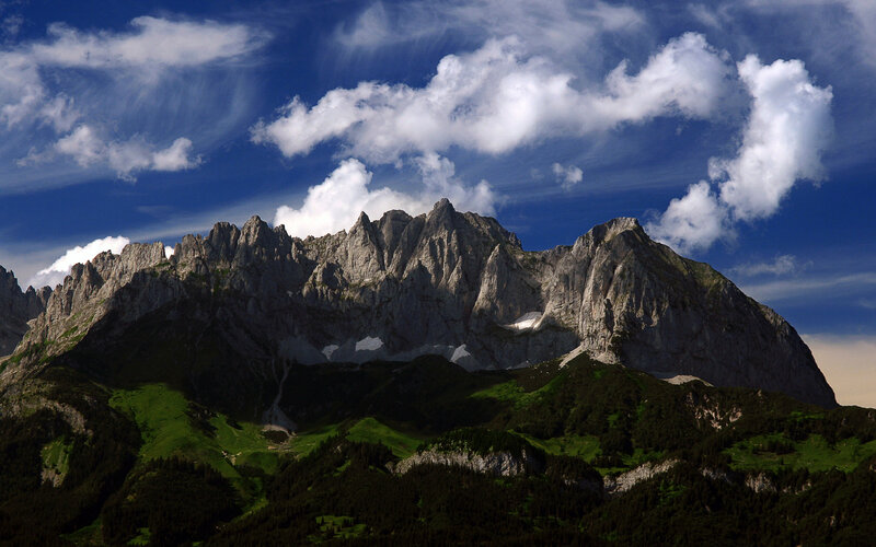Rugged mountain peak under blue sky
