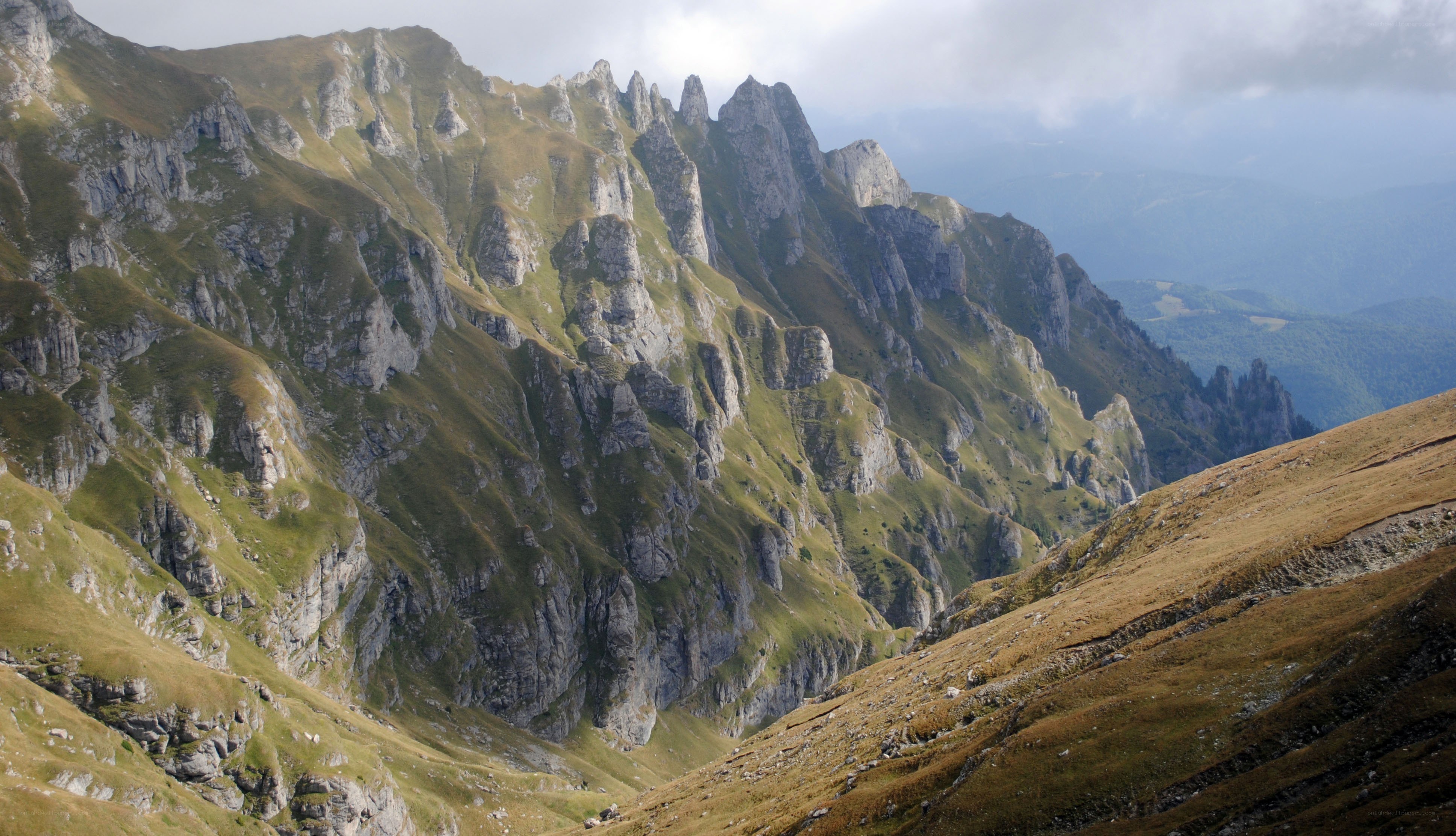Rugged mountain peaks and valleys