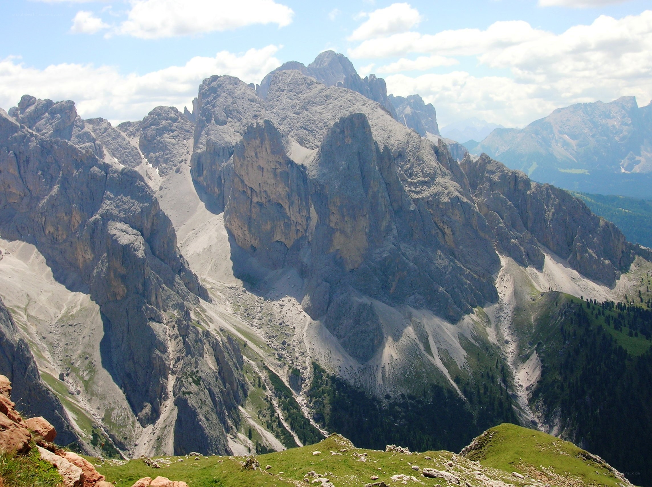Rugged mountain peaks under blue sky