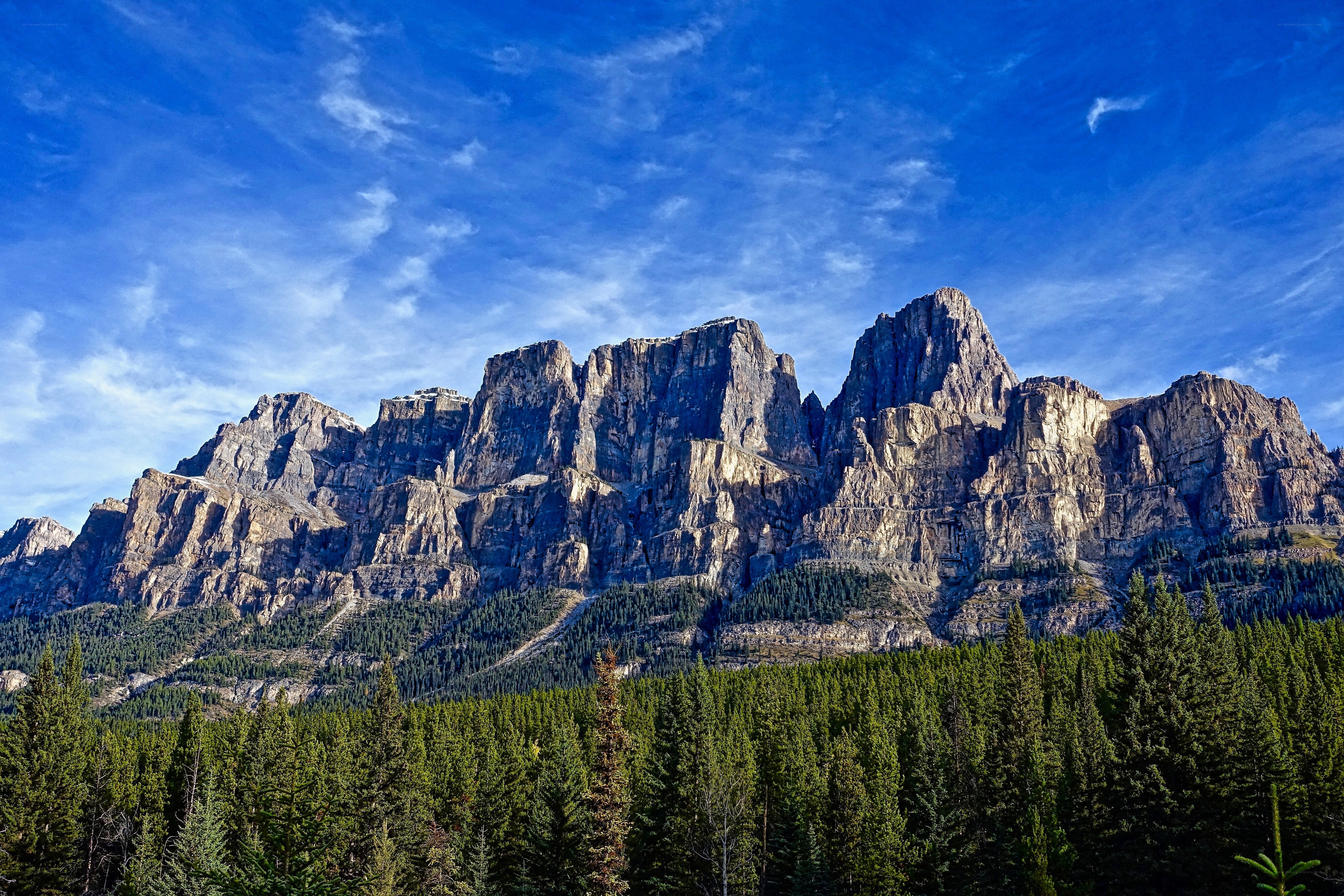 Rugged mountain peaks under blue sky