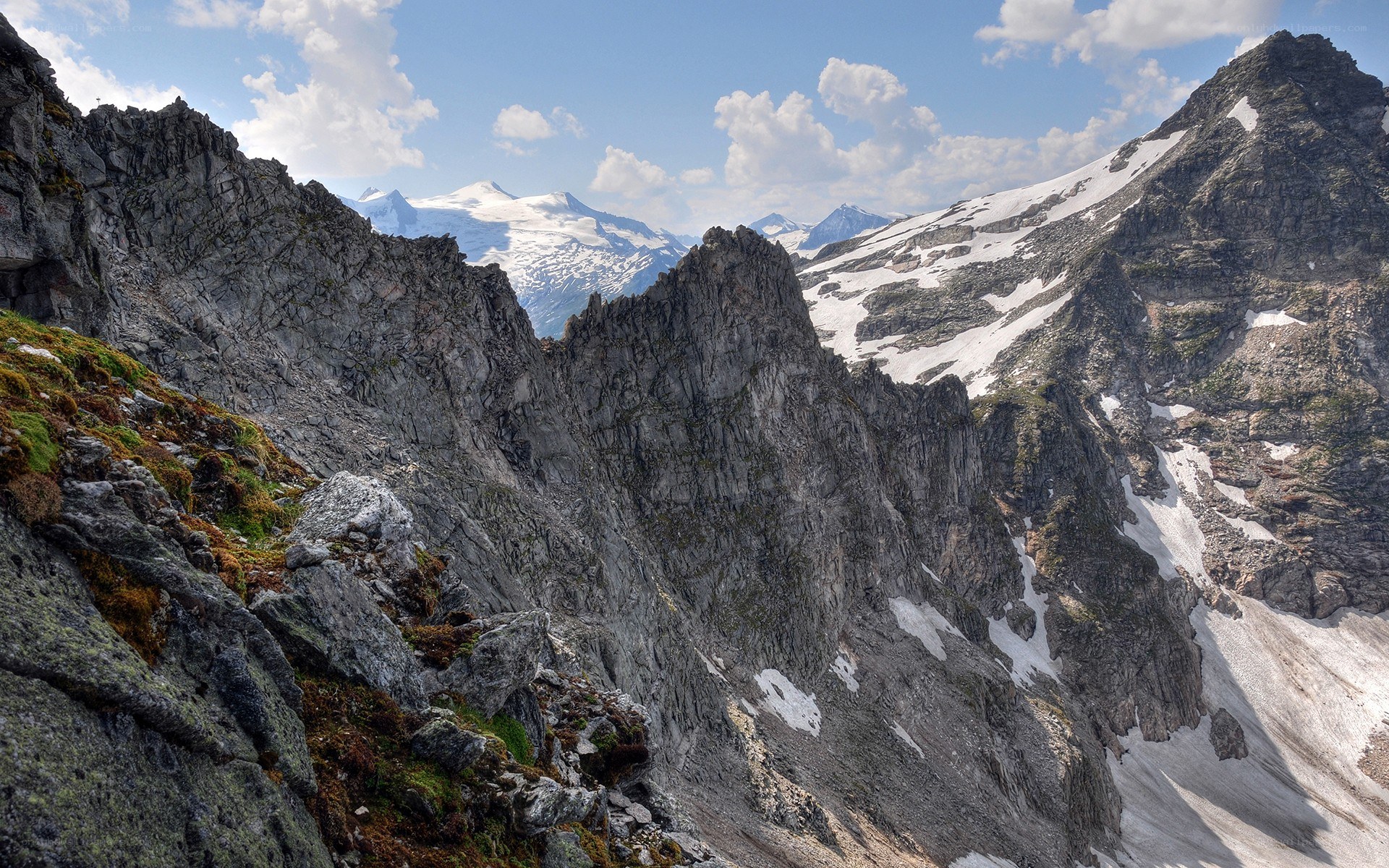 Rugged mountain peaks with snow