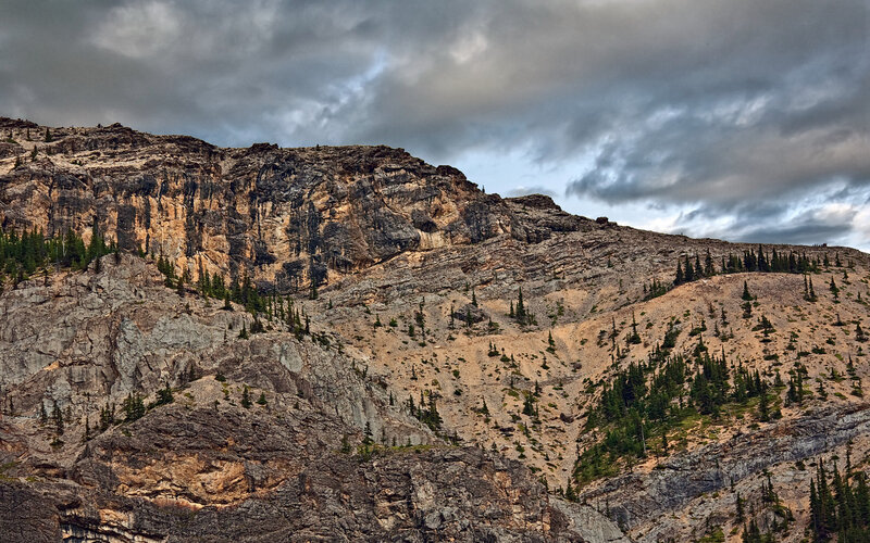 Rugged mountain under stormy sky