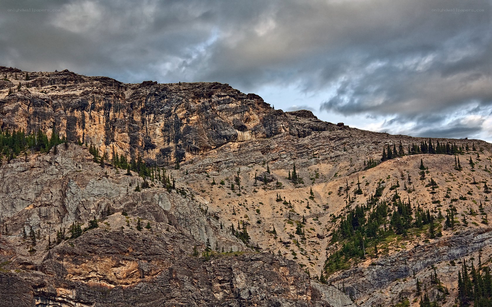 Rugged mountain under stormy sky