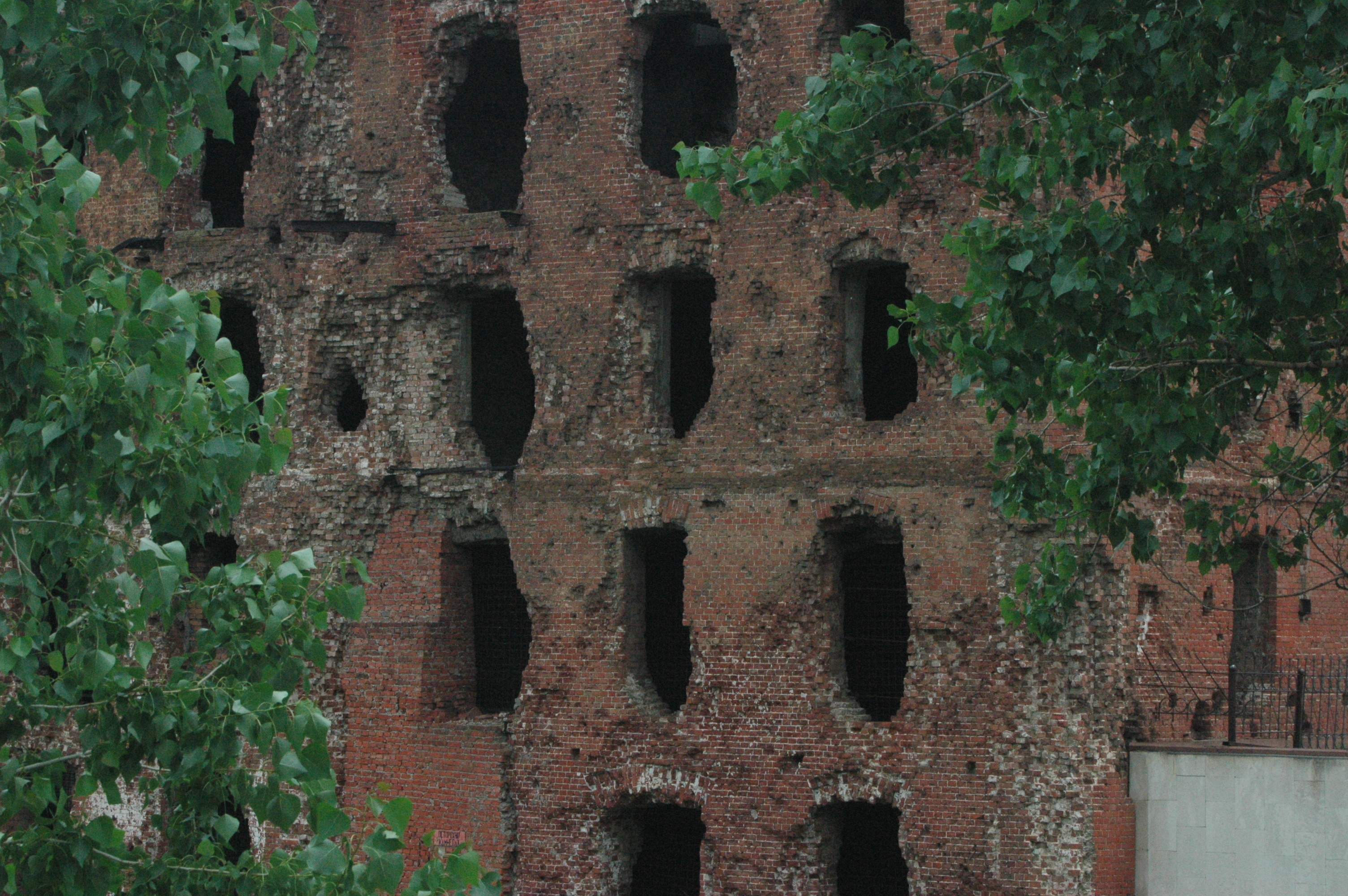 ruined brick building with trees