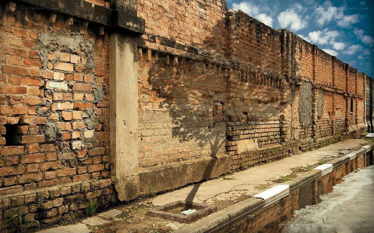 ruined brick wall and canal