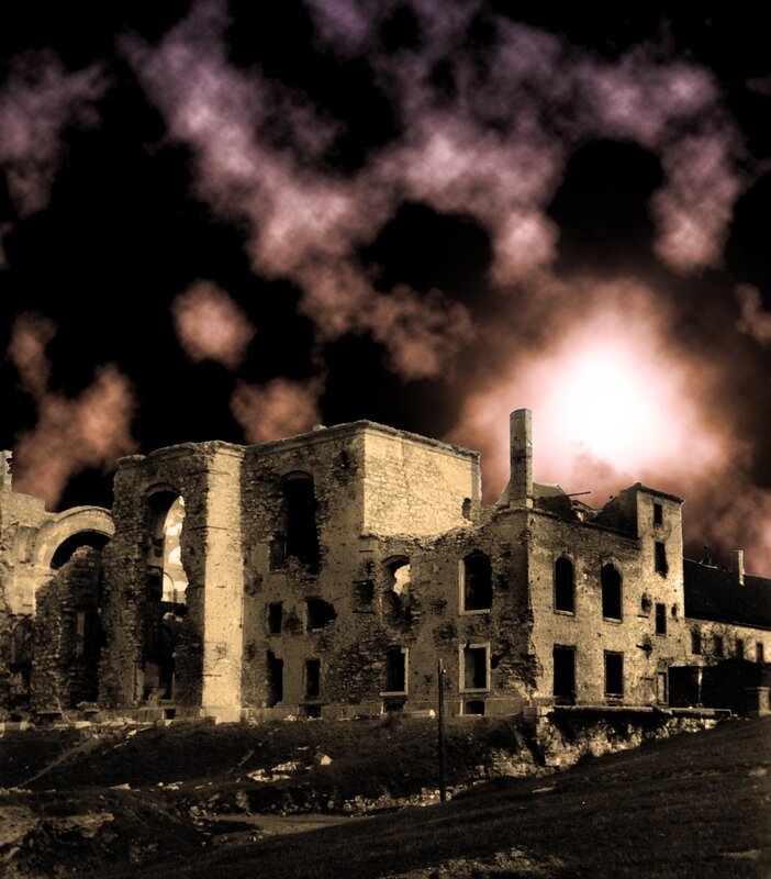 ruined building under stormy sky