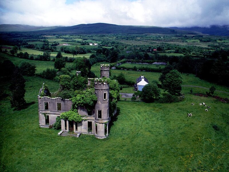 ruined castle in green fields