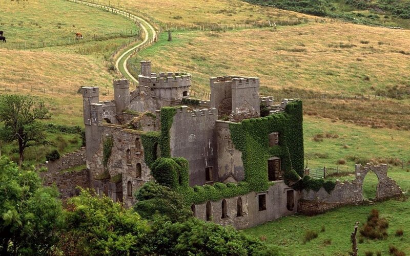ruined castle in green hills