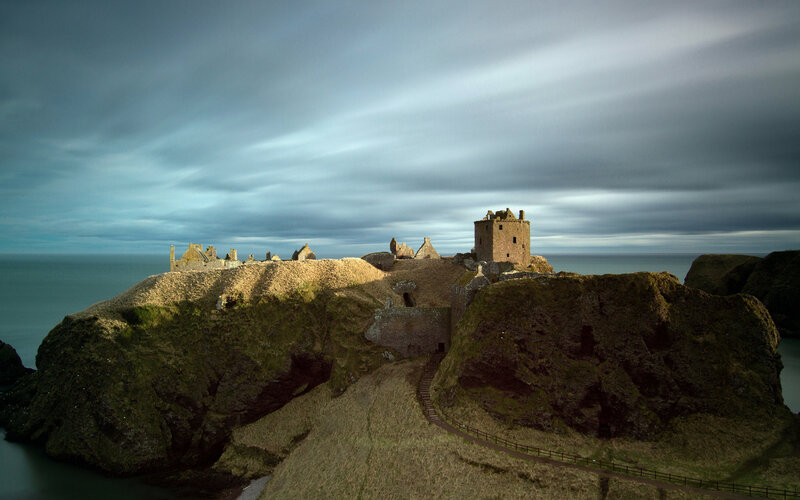 Ruined Castle on Cliff — Gray, Dramatic