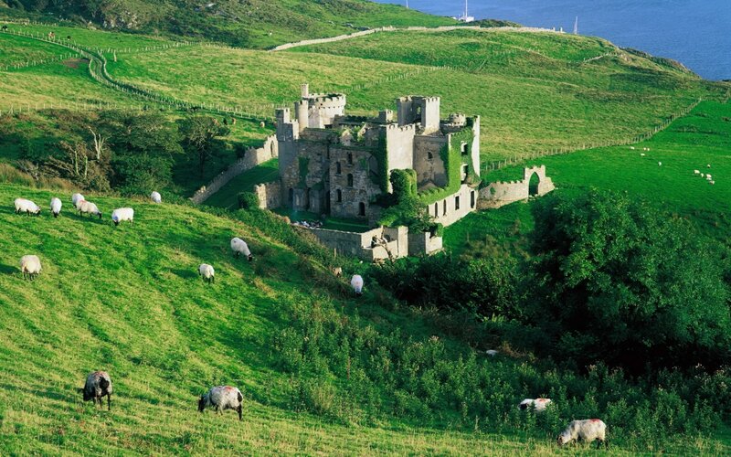 Ruined Castle on Hillside — Green, Serene, Afternoon