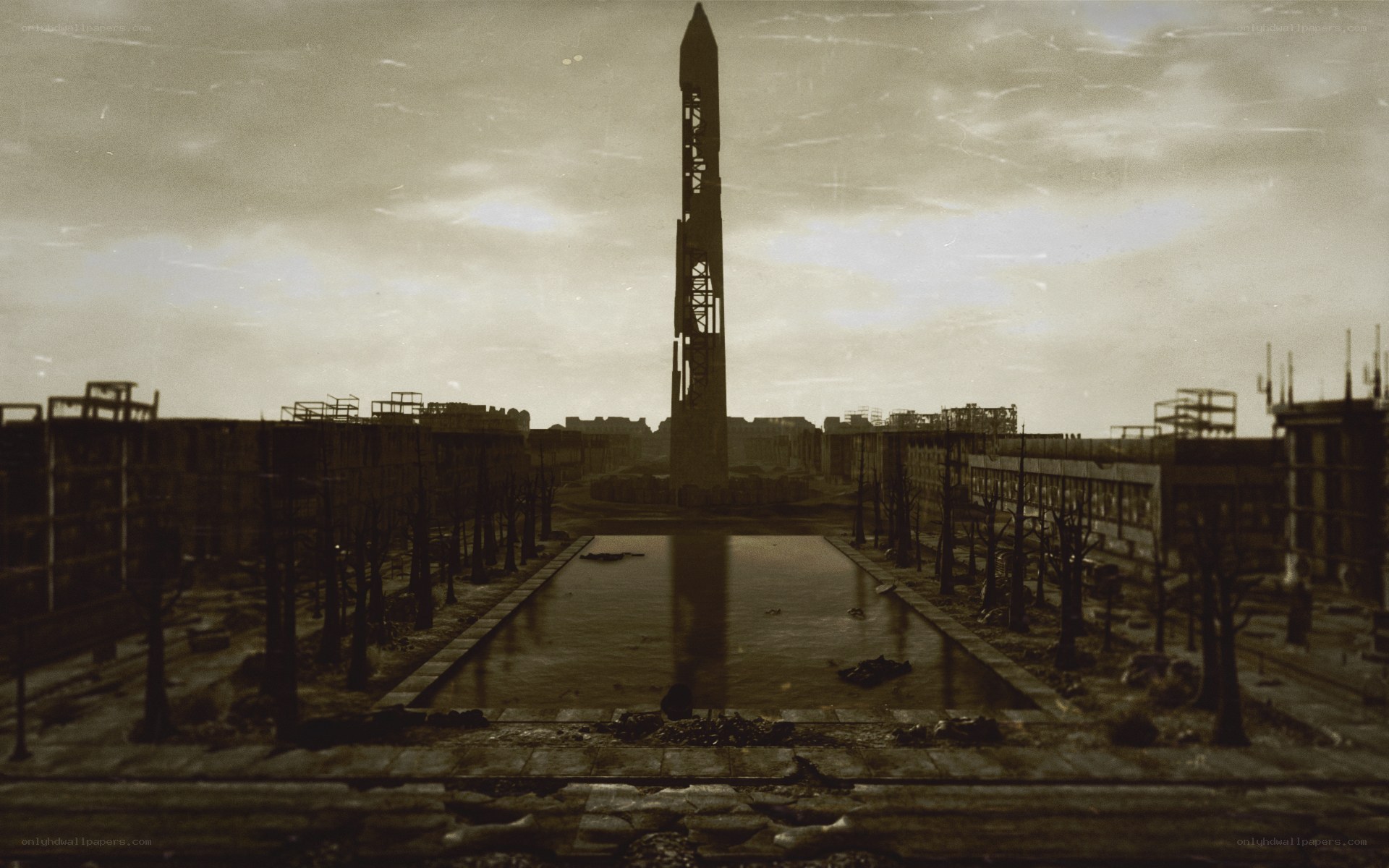 Ruined city with obelisk