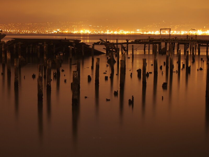Ruined Pier at Night — Orange, Dramatic, Photograph