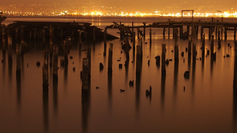 ruined pier at night