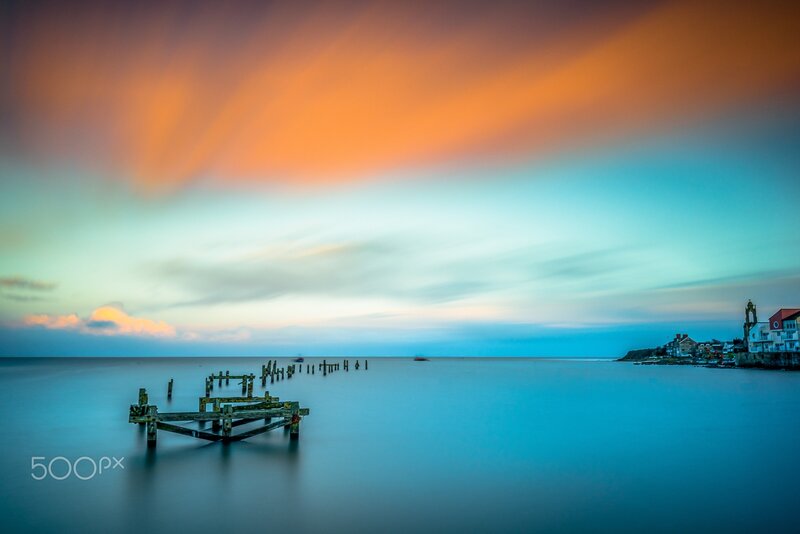 Ruined Pier at Sunset — Orange, Serene, Photograph