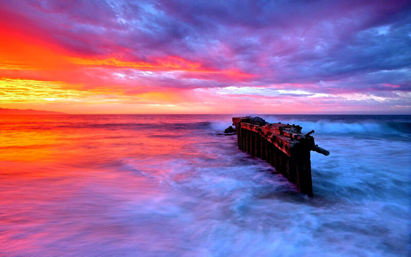 Ruined Pier at Sunset — Red, Dramatic, Photograph, Ocean