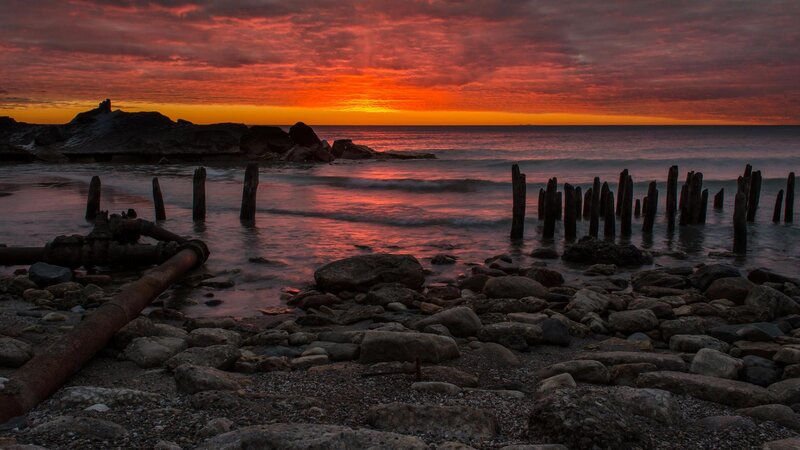 Ruined Pier at Sunset — Red, Dramatic, Photograph