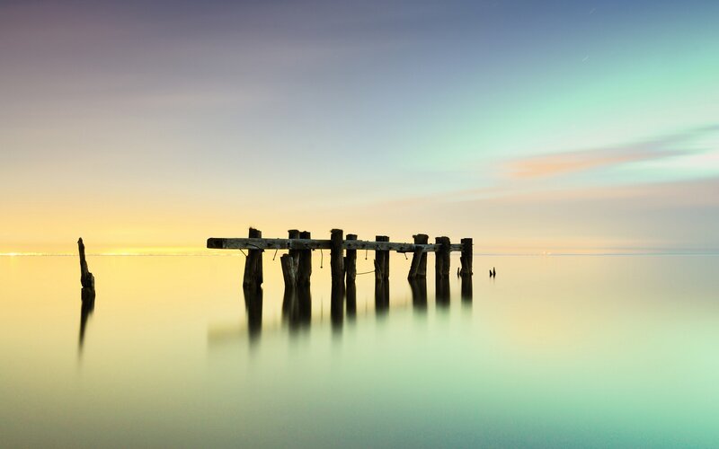 Ruined Pier at Sunset — Yellow, Serene