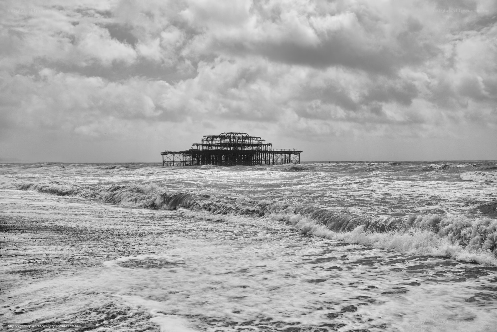 ruined pier in stormy sea