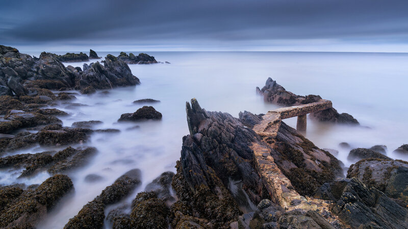 Ruined Pier on Rocks