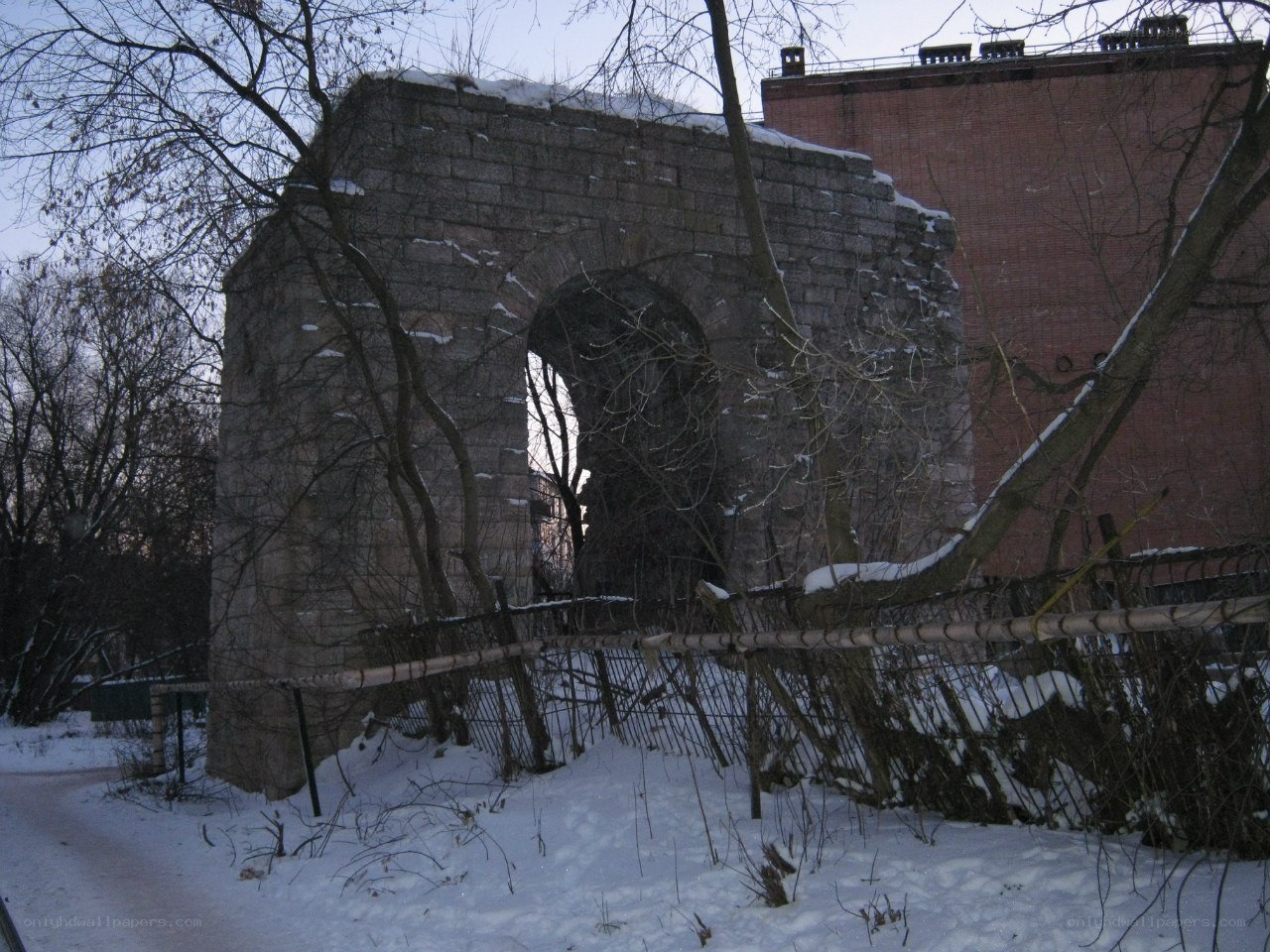 ruined stone arch in winter