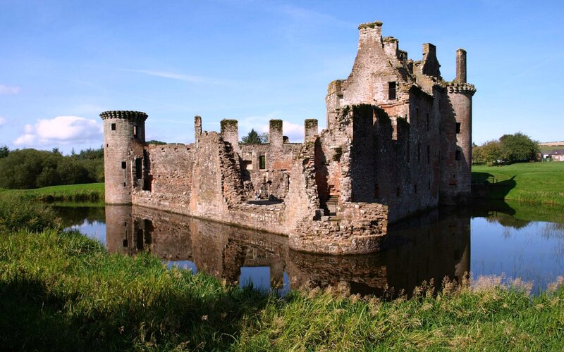 Ruined Stone Castle — Green, Serene, Afternoon, Photograph, Moat