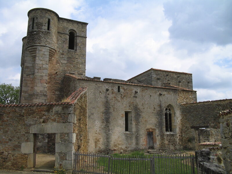 ruined stone church with tower