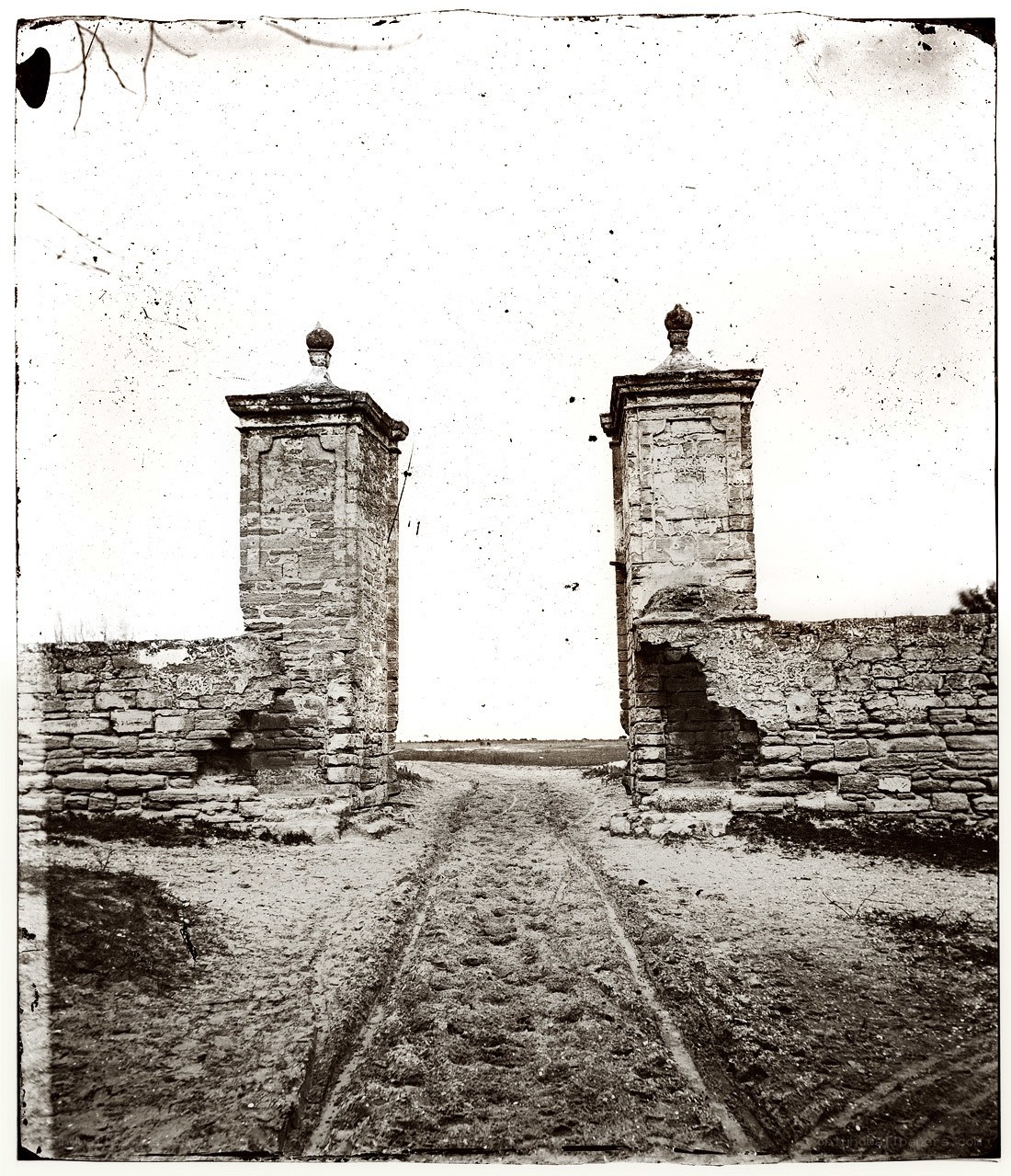 ruined stone gate pillars
