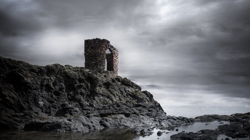 Ruined Stone Tower — Gray, Dramatic, Photograph