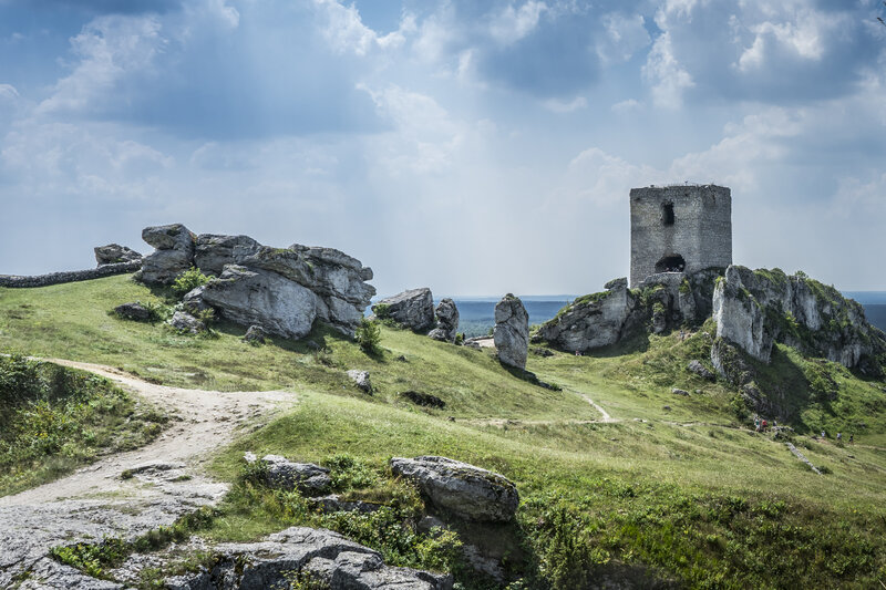 Ruined Stone Tower — Green, Serene, Afternoon, Photograph, Rock Formations