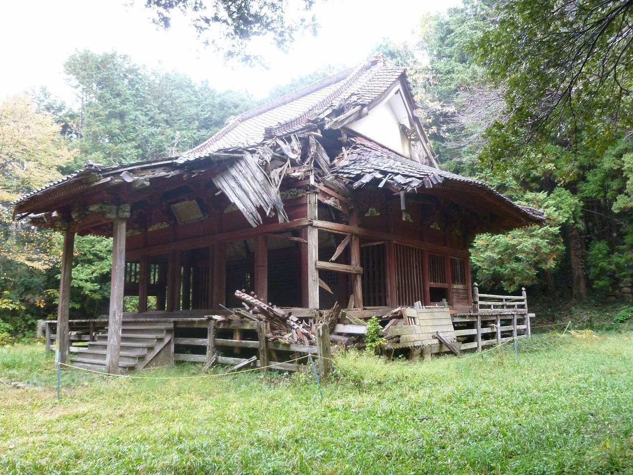 ruined wooden temple in forest
