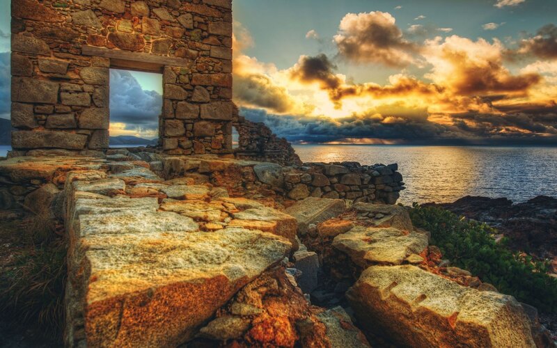Ruins at sunset by the sea