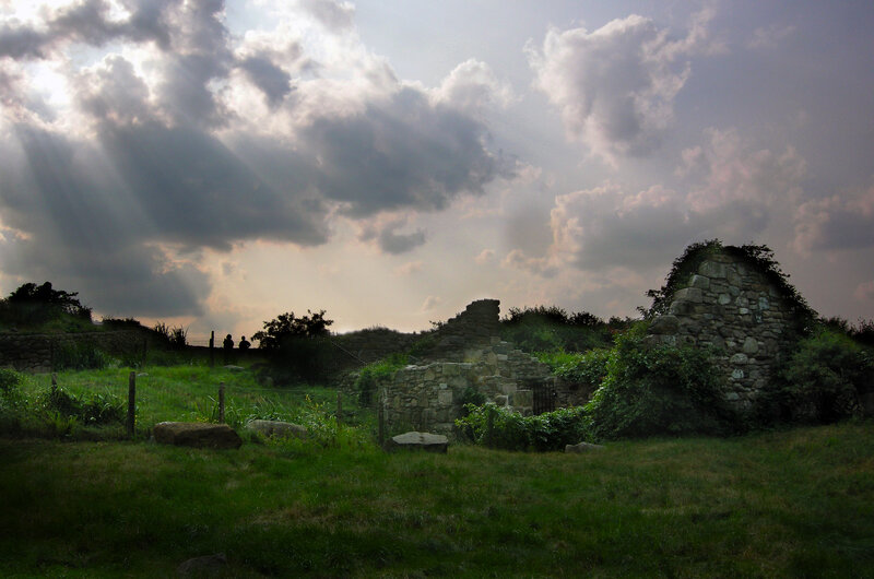 Ruins in a Grassy Field