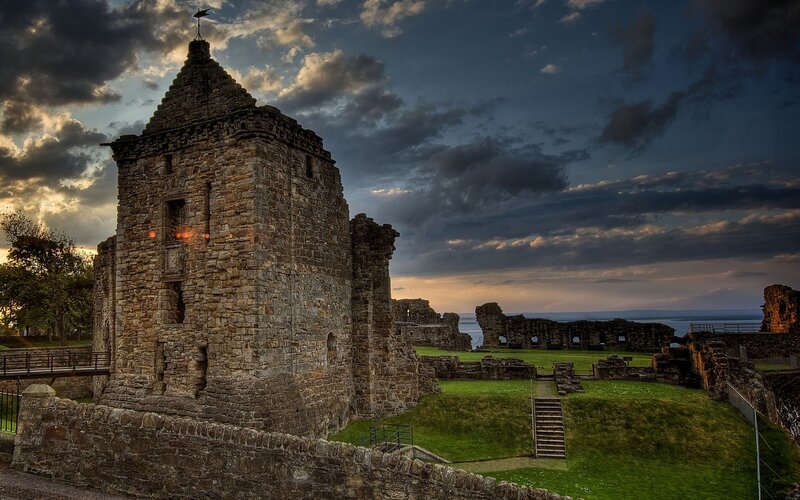 ruins of a castle at sunset