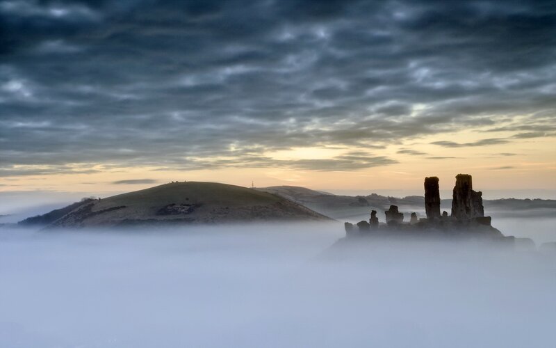 Ruins on a Foggy Hill