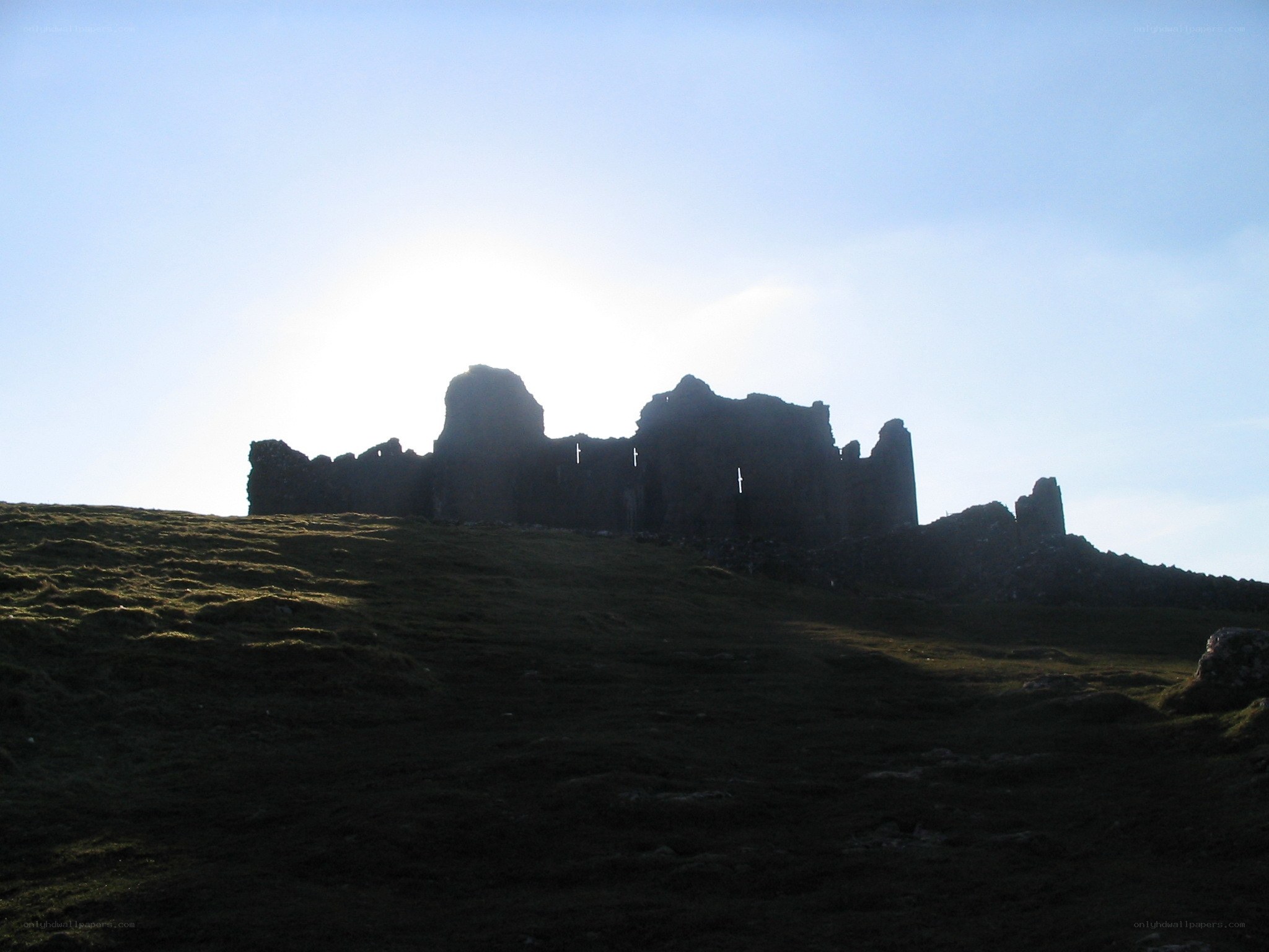ruins on a hill at sunset