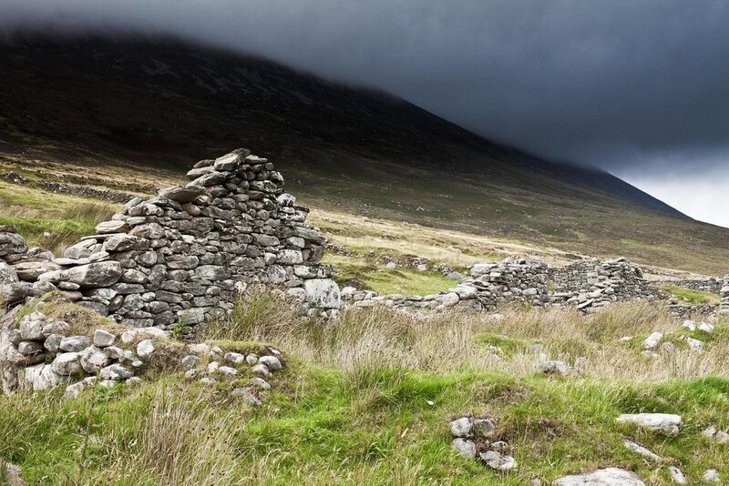 Ruins on a misty hillside