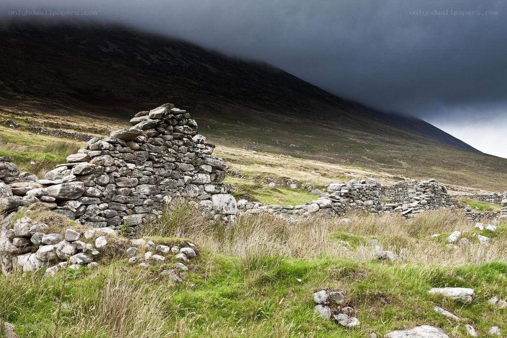 Ruins on a misty hillside