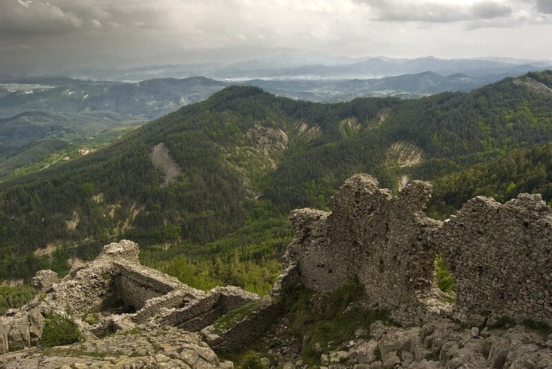 Ruins overlooking a forested valley
