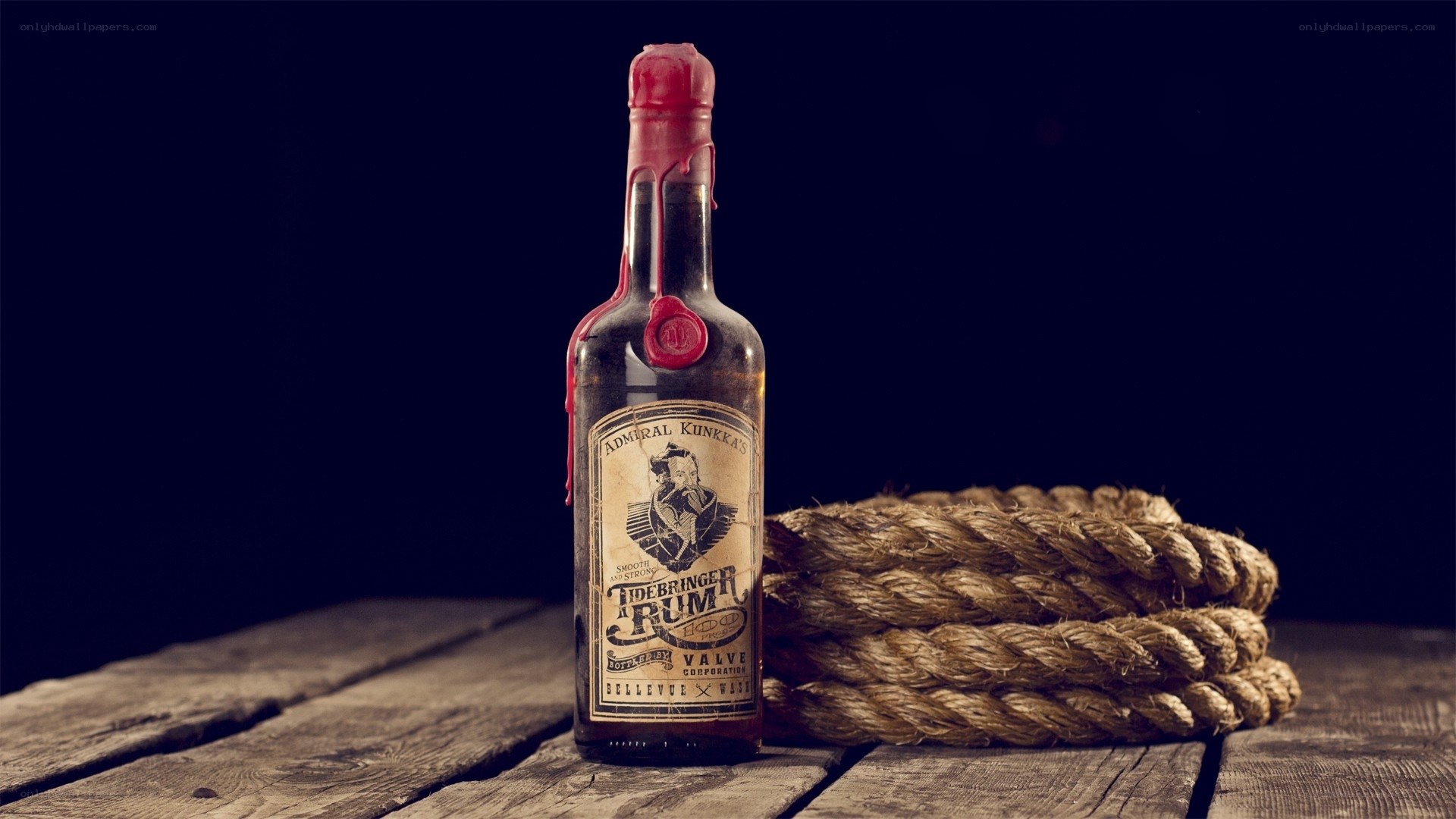 Rum bottle with rope on wood