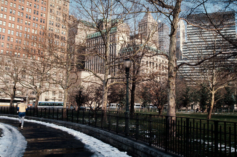 Runner in a city park