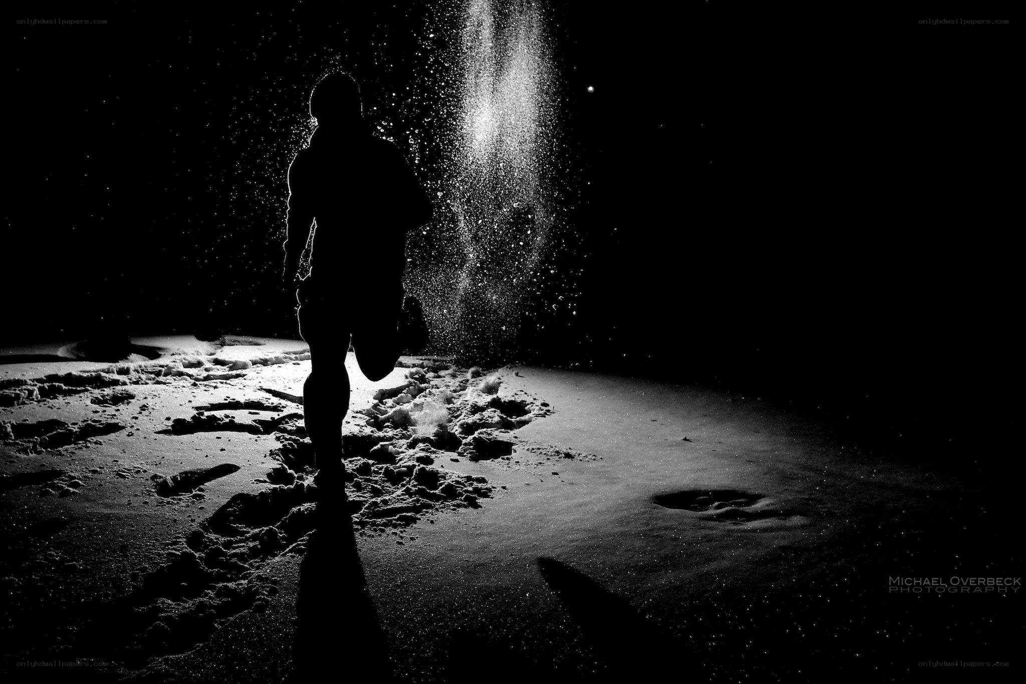 Runner in snowy night