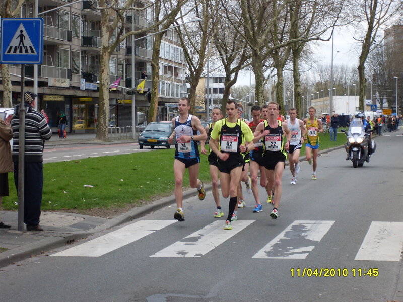 Runners crossing a street