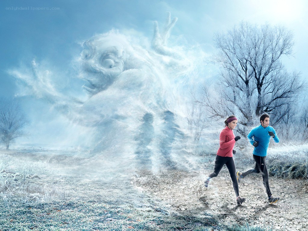 Runners in winter landscape