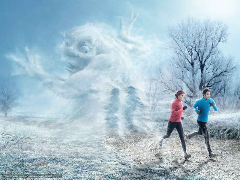 Runners in winter landscape