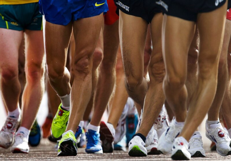 runners' legs in motion